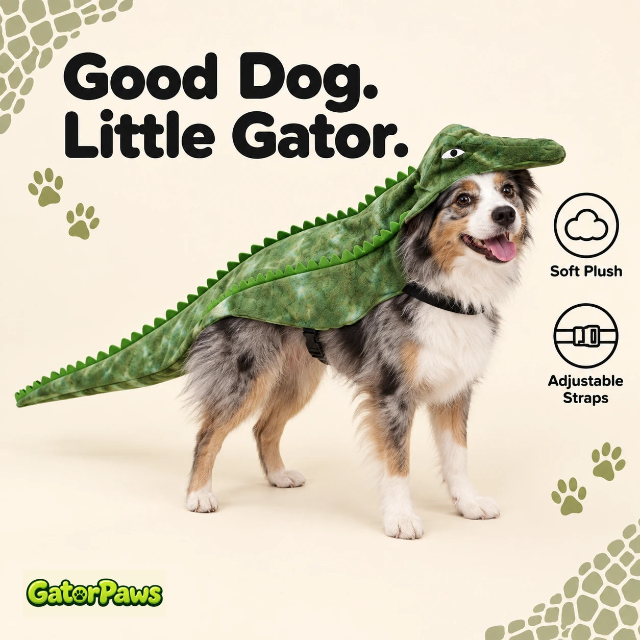 Small dog wearing the green alligator cape